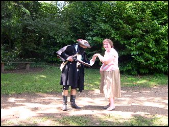 A famous highwayman inspects a clients jewels, thank goodness Harry was there to protect her 